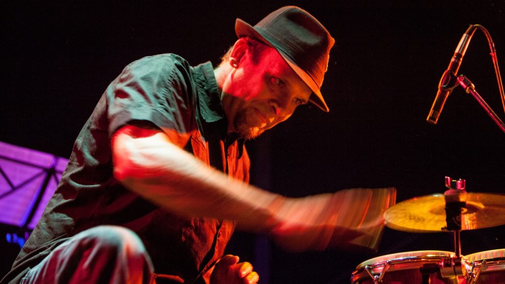 Gabe Harris performing on bongos